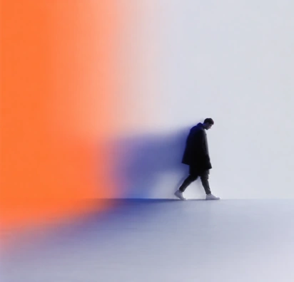 Figure walking through an orange haze